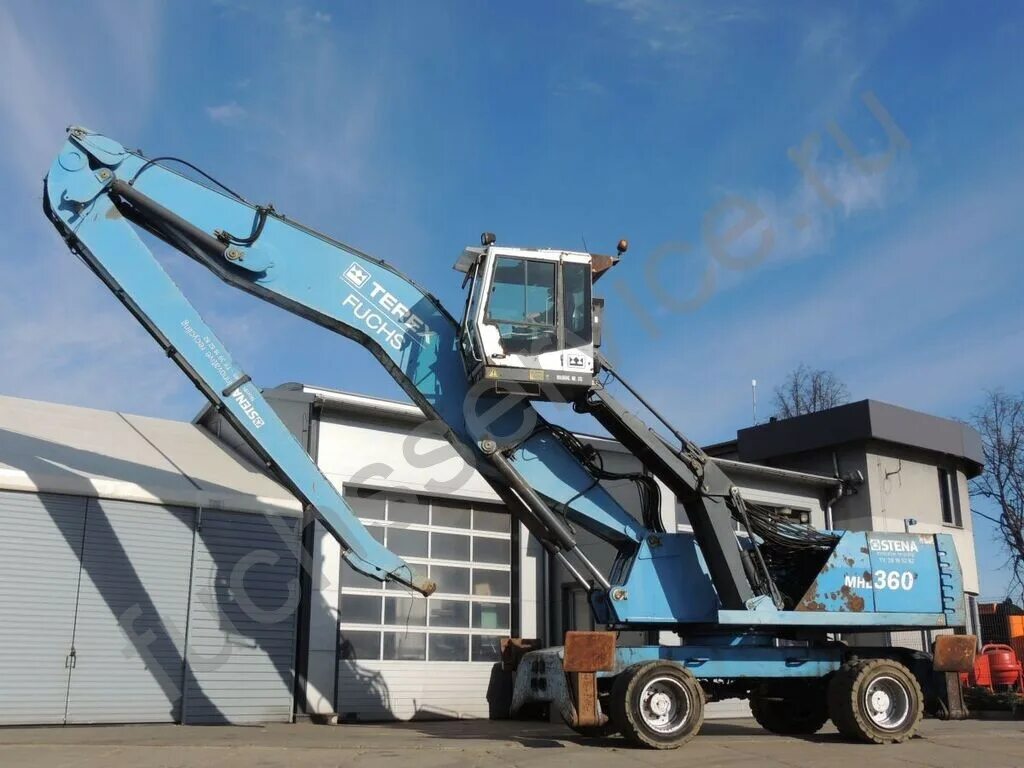 Fuchs 360. Погрузчики fuchs mhl 360. перегружатель fuchs mhl 360. фукс погрузчик перегружатель. fuchs mhl 360 грейферный погрузчик.