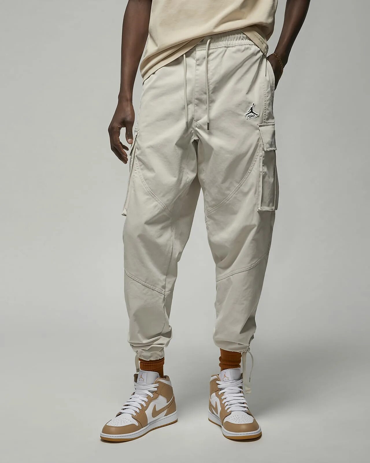 Essentials statement. Jordan essentials штаны. карго с джорданами. штаны jordan pants cargo. jordan utility pants.