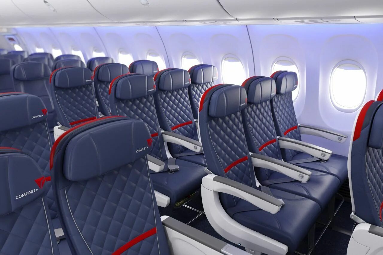 Seating plane. Delta airlines салон boeing 737-800. Самолет дельта эйрлайнс салон. Салон самолёта в синих тонах. Кресла пассажирские авиационные.