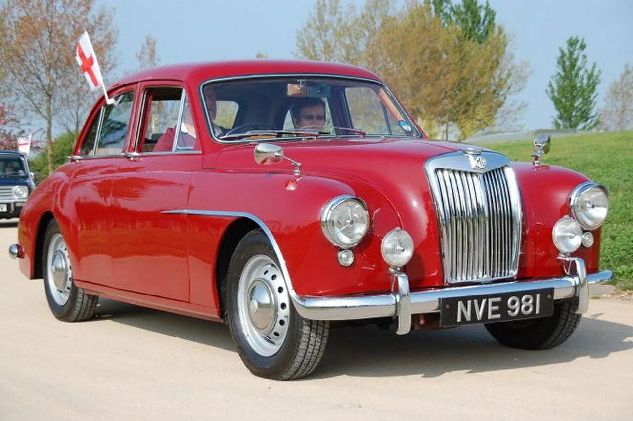 Mg британия. 1960 mg roadster. Mg британия. Mg tf. Автомобильная марка mg.