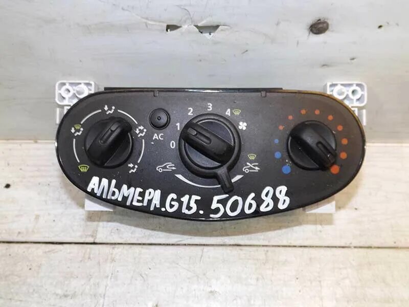 Печка ниссан альмера g15. Управление отопителем nissan almera g15. блок управления печкой ниссан альмера g15. блок управления отопителем ниссан альмера g15 артикул. панель управления печкой альмера g15.