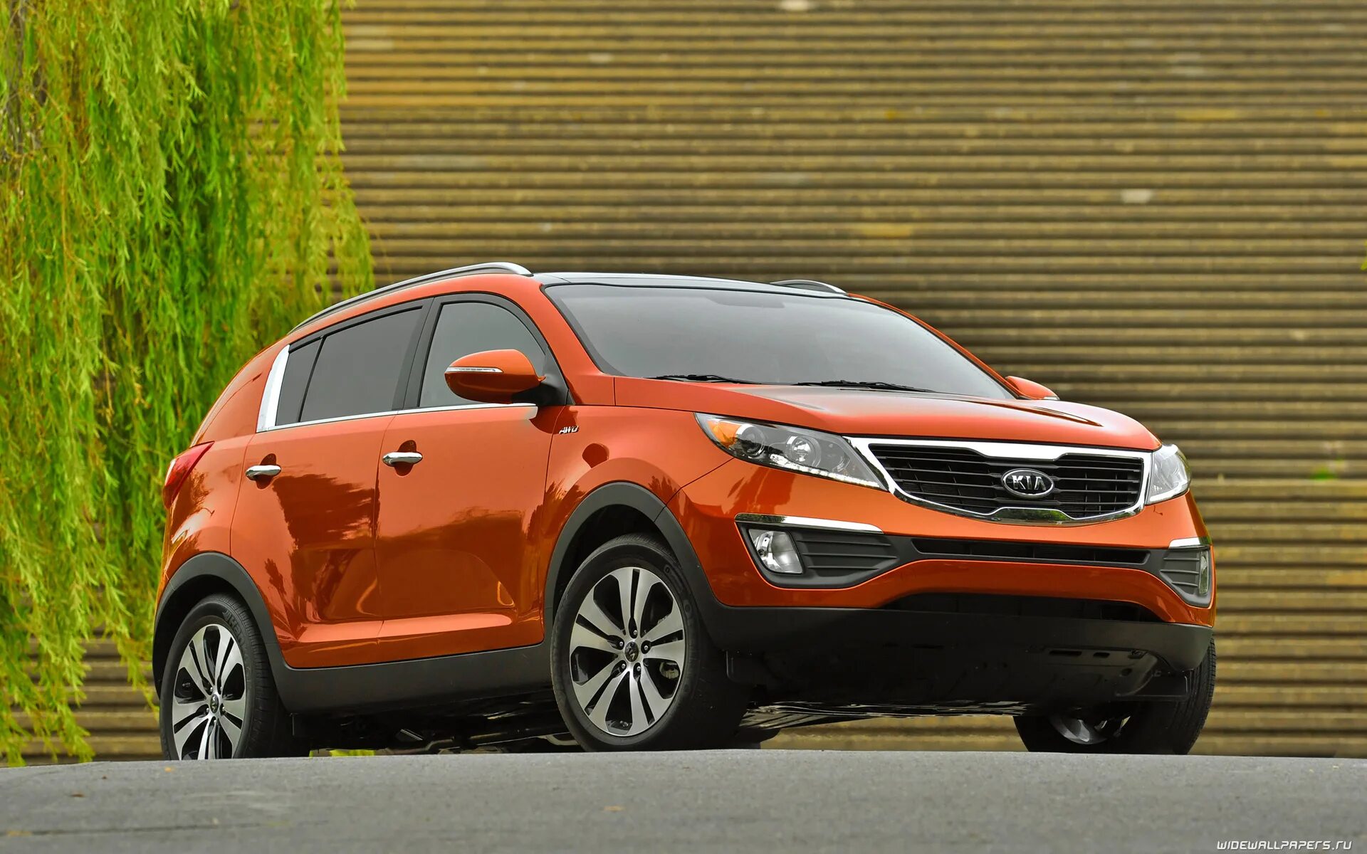 Киа машина страна. Kia Sportage 2011. Kia Sportage 3. Киа Спортейдж 2012 оранжевый. Киа Спортейдж 2013.