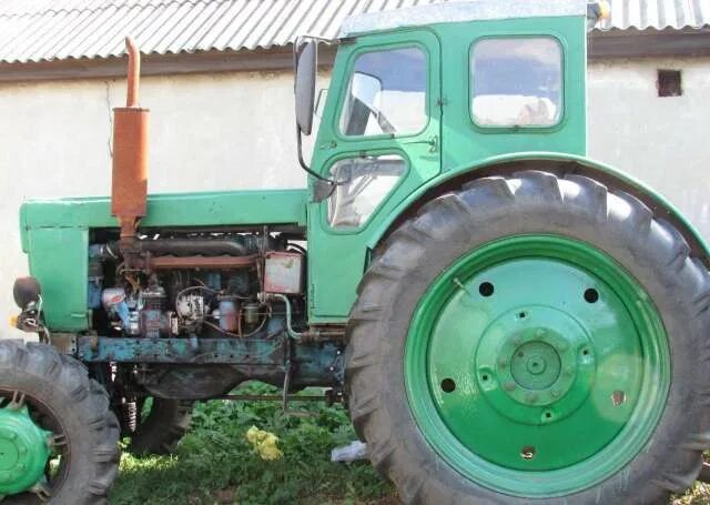 Авито т40. Трактор колесный т40 ам. Трактор т-40 с навесным. Т-40 ам трактор с косилкой. Трактор 40 а т 40а.