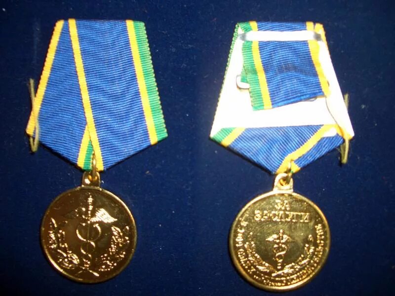 Объединение международное награды. Награды оон для миротворцев. Медаль флоренс найтингейл. Грамоты и медали. Медаль имени летчика космонавта ссср ю.