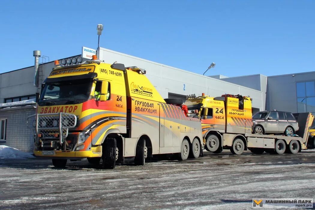 Volvo omars 120t. Грузовой эвакуатор титан буксир. Грузовой эвакуатор вольво 30 т. Эвакуатор спецбуксир. Спецбуксир грузовая эвакуация.