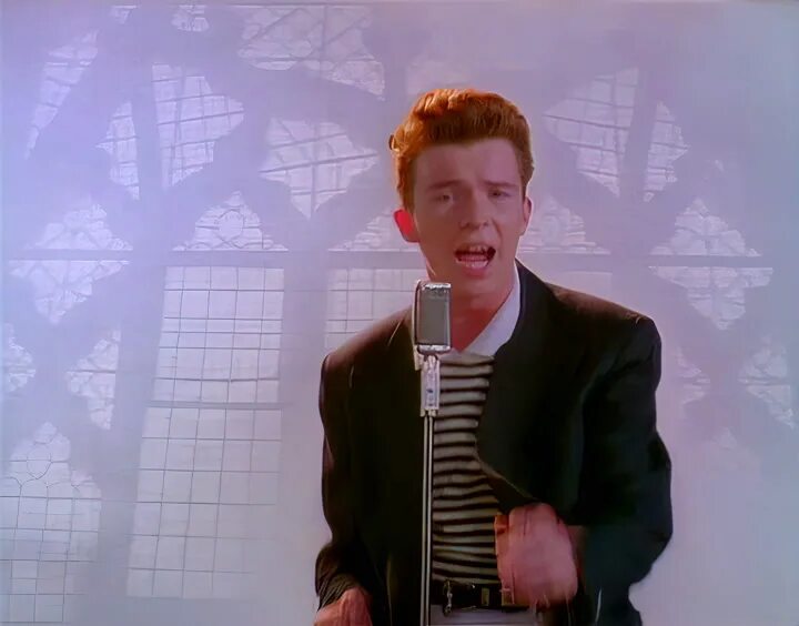 Музыка рикролл. Rick Astley. Rick Astley RICKROLL. Рик Эстли never gonna give. Рик Эстли во весь рост.