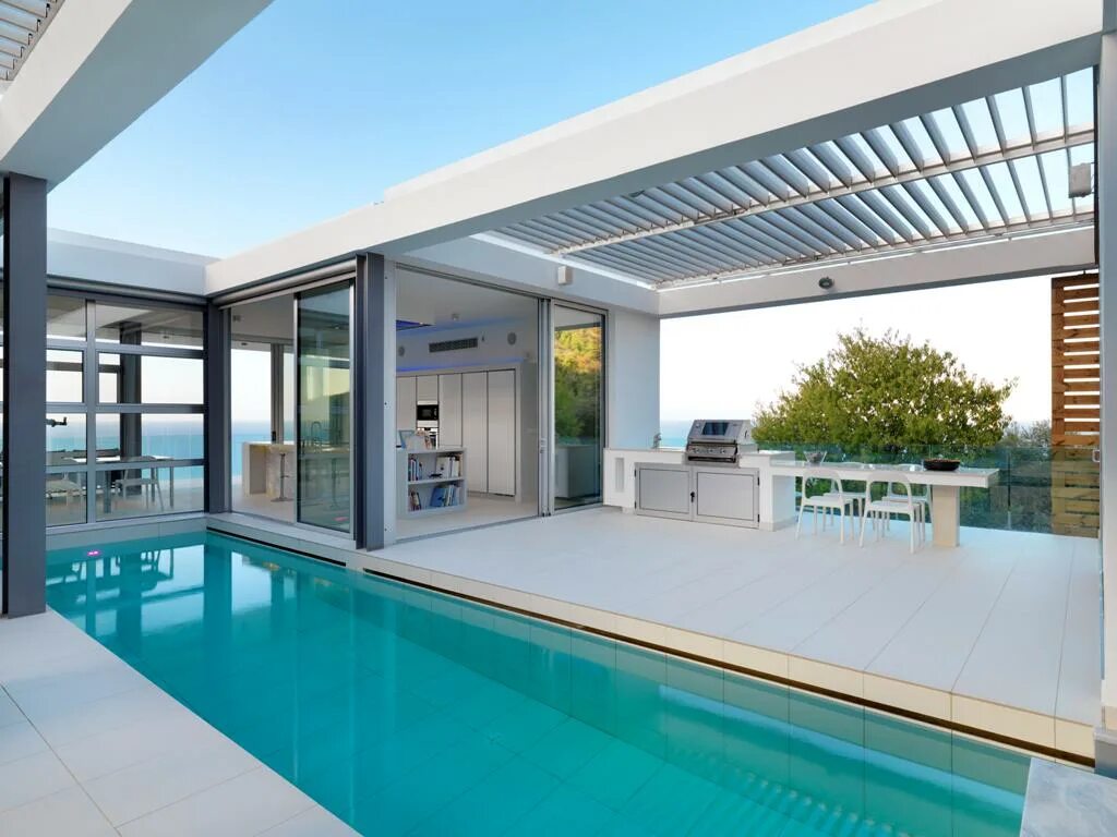 Бассейн хай тек. Обустройство бассейна. Особняк в современном стиле. Дом в современном стиле с бассейном. Бассейн в стиле хай тек в доме.