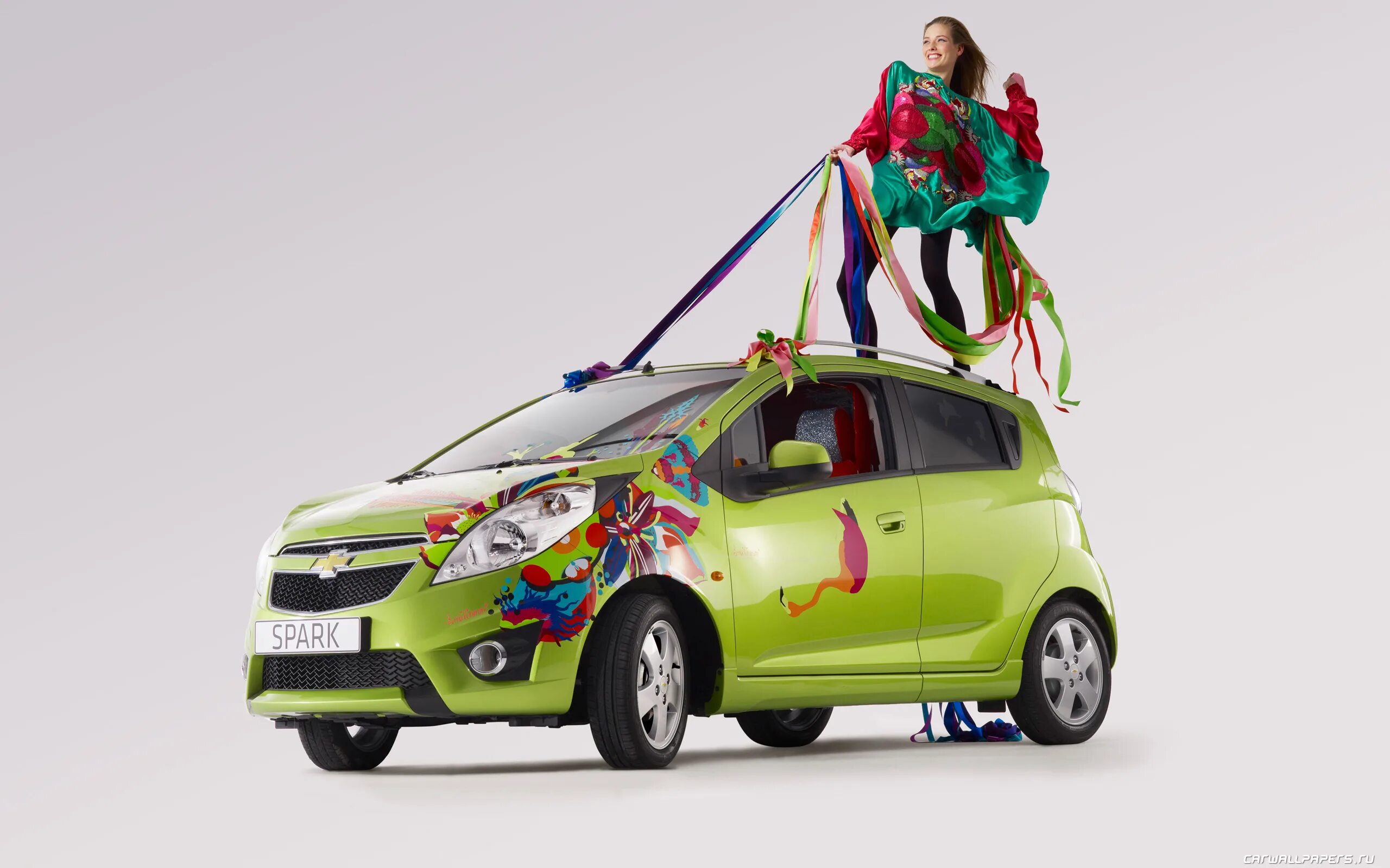 Обои на спарк про 10. Автомобиль Chevrolet Spark. Chevrolet Spark 2010. Chevrolet Spark Wallpaper. Шевроле Спарк электромобиль.