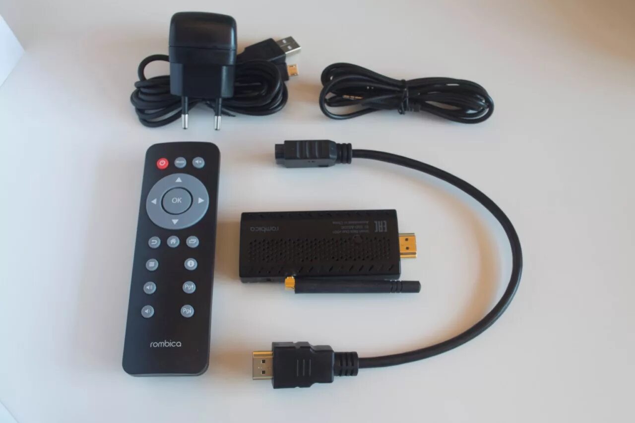 Приставка для телевизора stick. Rombica Smart Box v002. Smart-TV приставка Rombica Smart Stick 4k v002. Смарт бокс ультра HD v002. Приставка Ромбика смарт бокс v001.