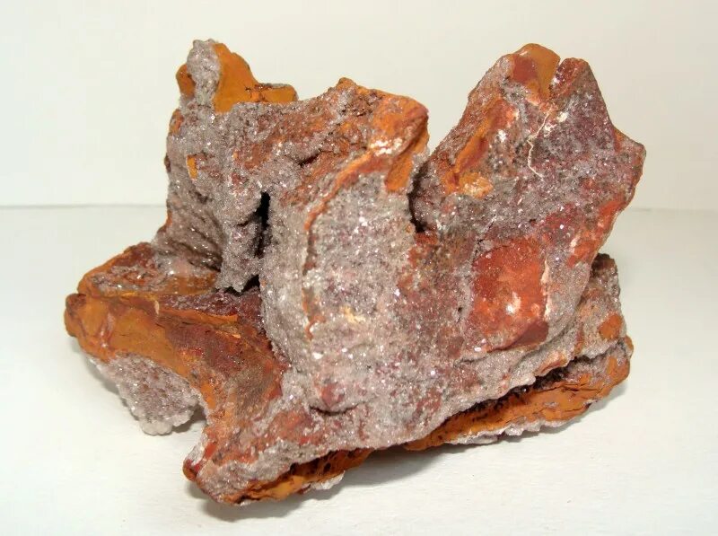 Ni co zn. Смитсонит минерал. Смитсонит коричневый. Систематическая коллекция минералов. Смитсонит розовый.