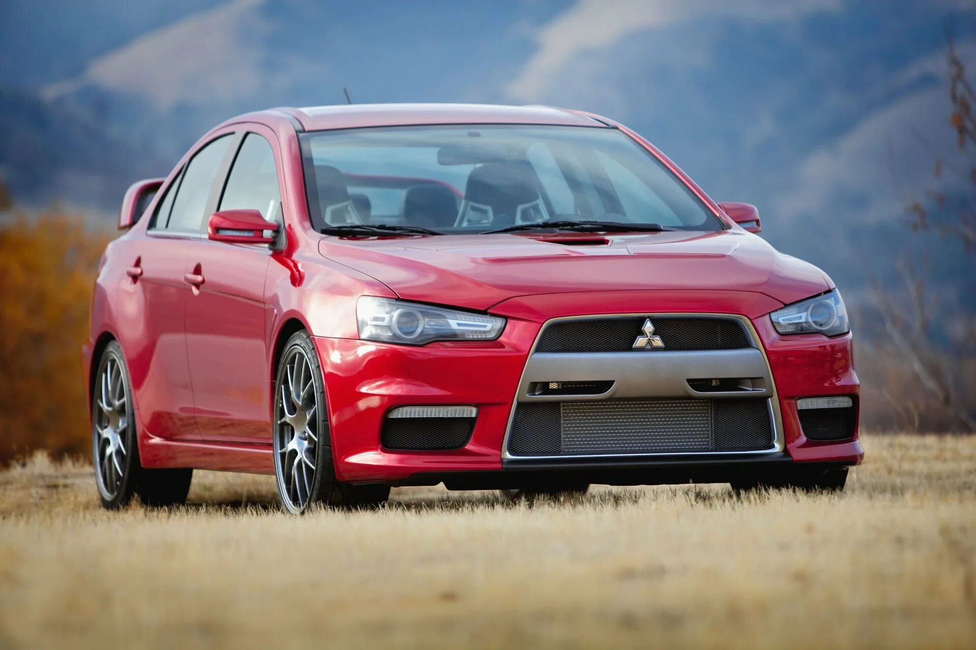 Митсубиси Лансер 10 EVO. Mitsubishi Lancer Эво 10. Митсубиши Лансер эко 10. Митсубиси Лансер Эволюшн 10 красный.