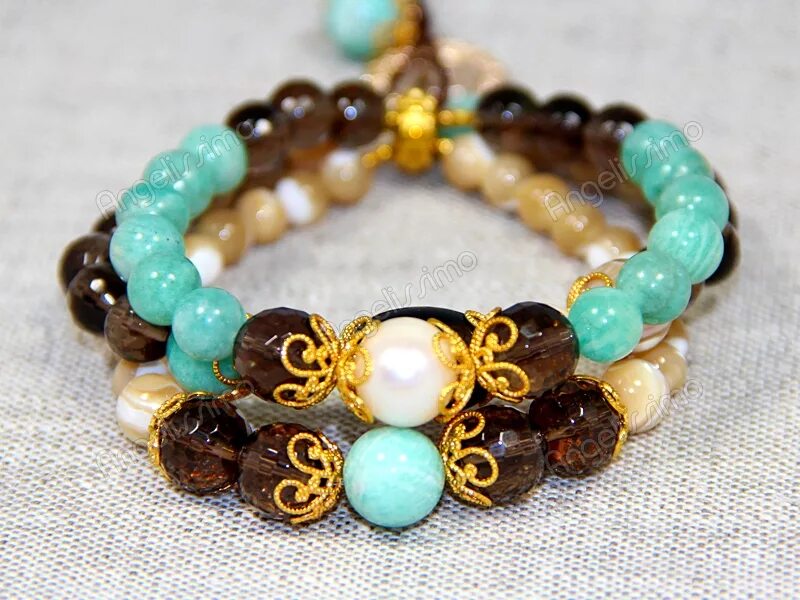 браслет из натурального камня. речная галька для бани. самоцветы урала полудрагоценный камень. волосатик с турмалином. браслет из розового кварца и турмалина.