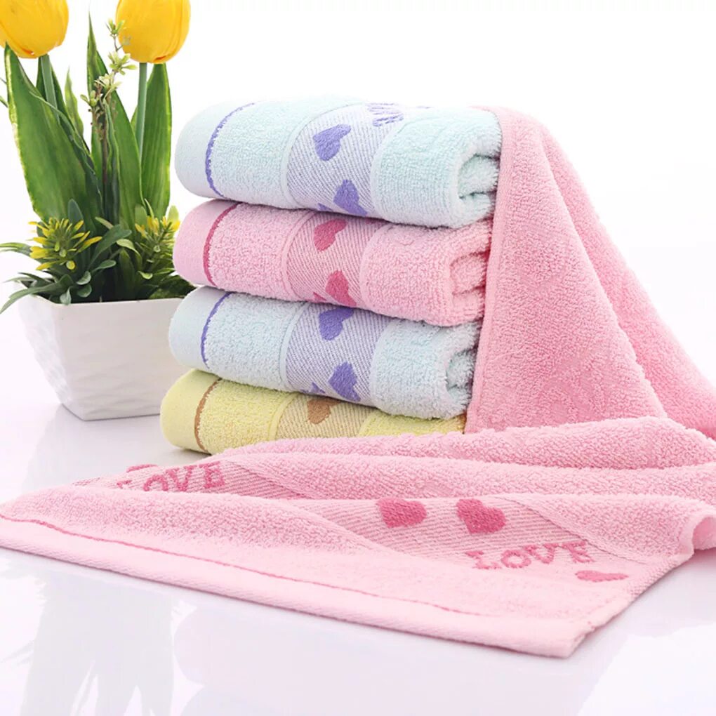 Дизайн полотенца. Полотенце для лица. Хлопчатобумажное полотенце. Полотенца в ванной. Дизайнерские полотенца.