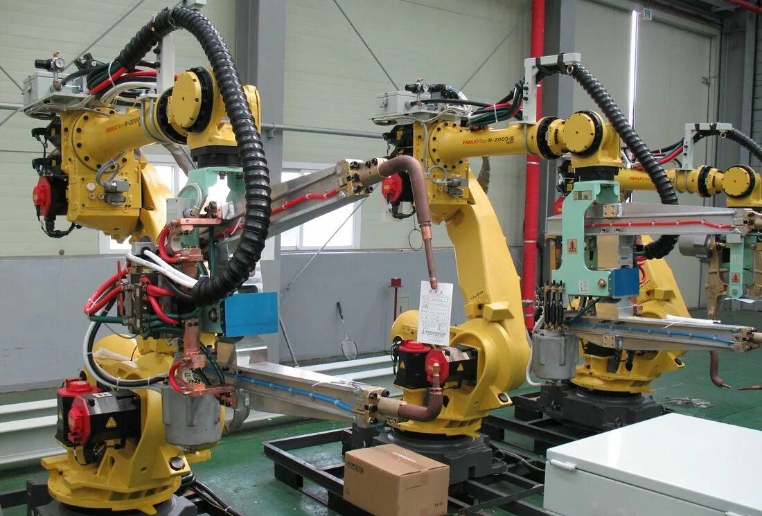 промышленный робот kuka. роботизированные захватные системы kawasaki. робот паллетоукладчик kuka. роботы манипуляторы на производстве. промышленный робот манипулятор.