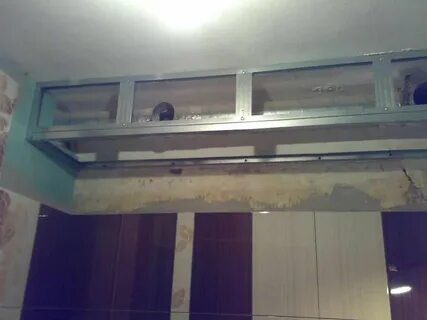 Как закрыть трубы на потолке