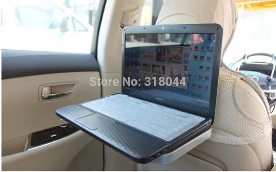 Крепление ноутбука в авто. Столик автомобильный. Ноутбук в автомобиле. Крепление для ноутбука в машину. Держатель для ноутбука в машину.