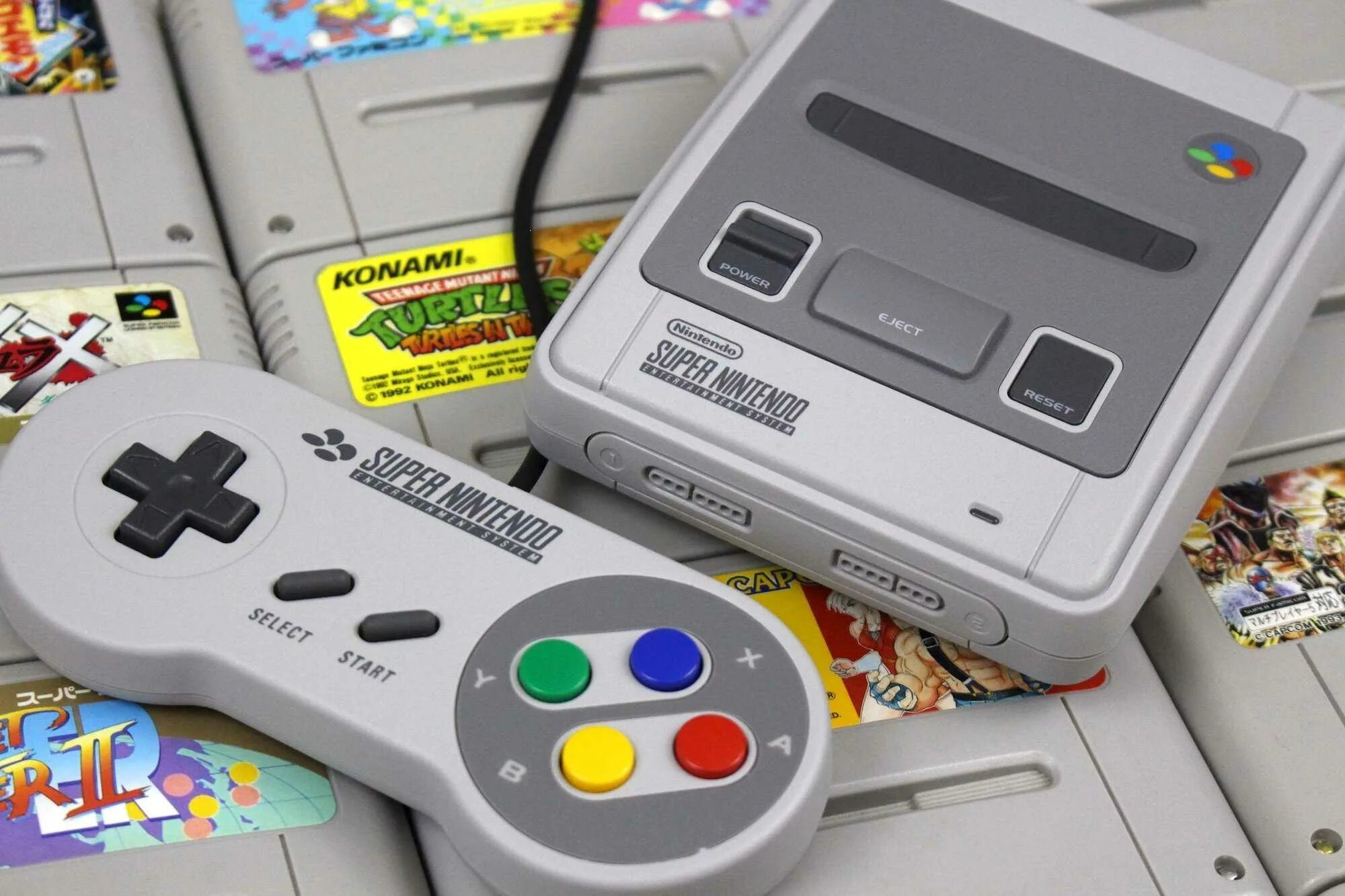 Какую nintendo выбрать. Приставка супер Нинтендо. Консоль Nintendo Snes. Нинтендо Snes. Нинтендо супер Нинтендо.