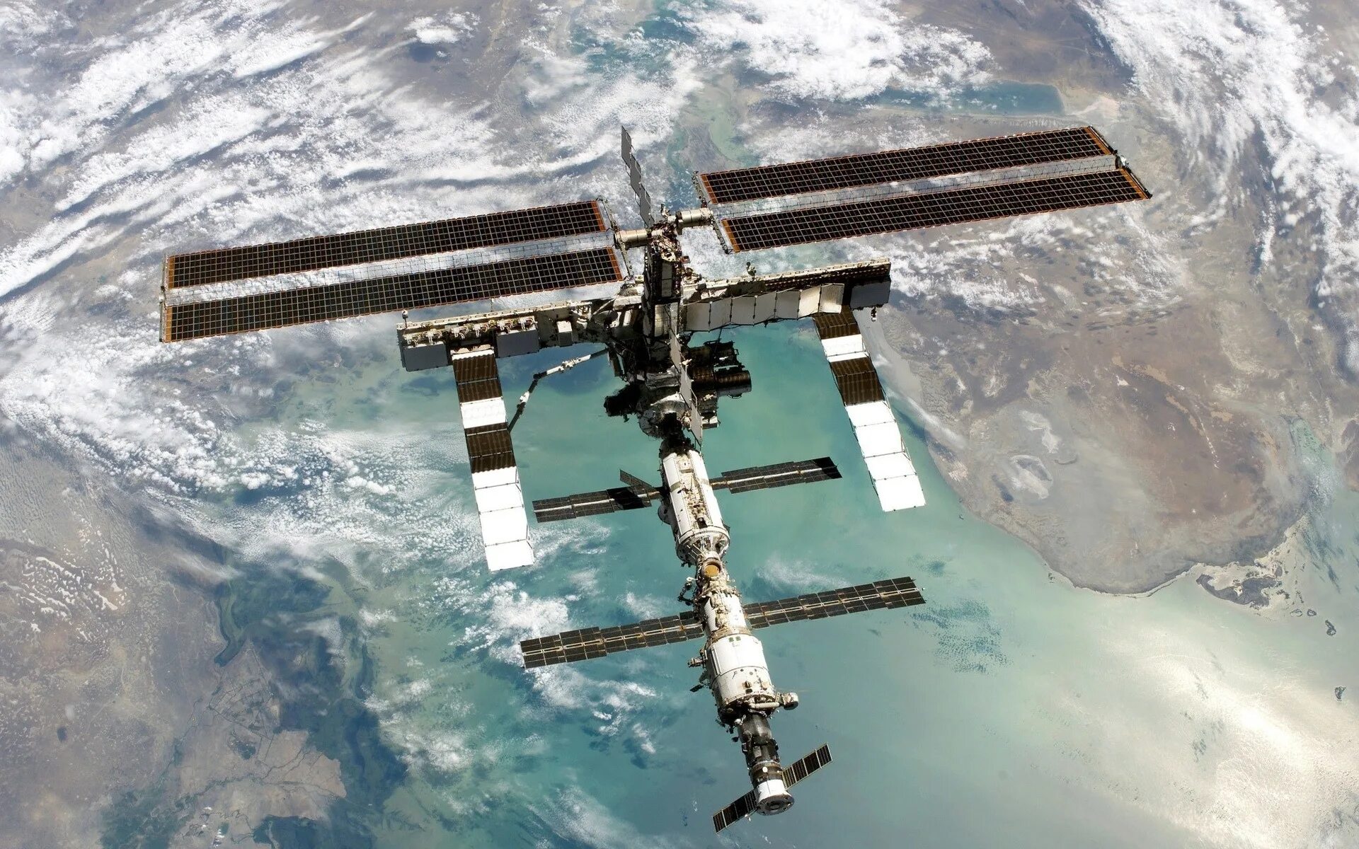 Первая космическая станция на орбите. Международная Космическая станция МКС. Космическая орбитальная станция МКС. Международная Космическая станция ISS. Спутник НАСА станция МКС.