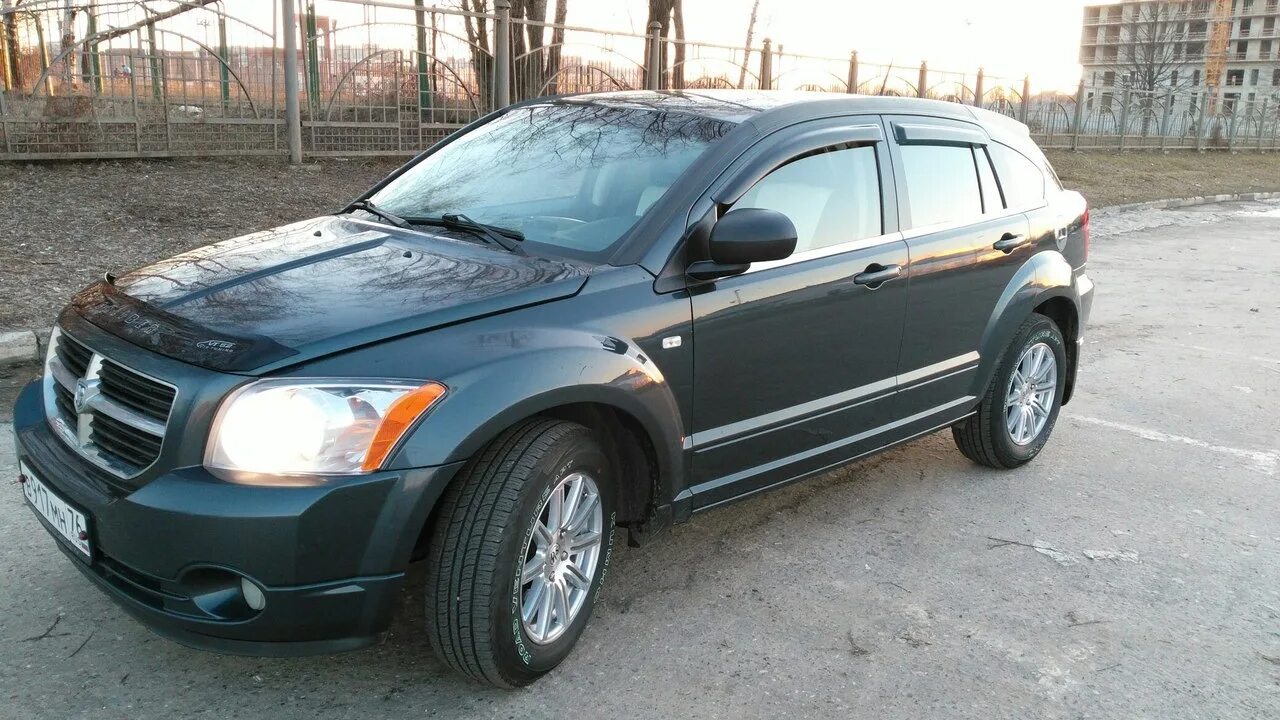 Dodge caliber 2.0. Додж Калибер 2008 арки. Накладки на арки dodge Caliber. Накладки на арки Додж Калибер.