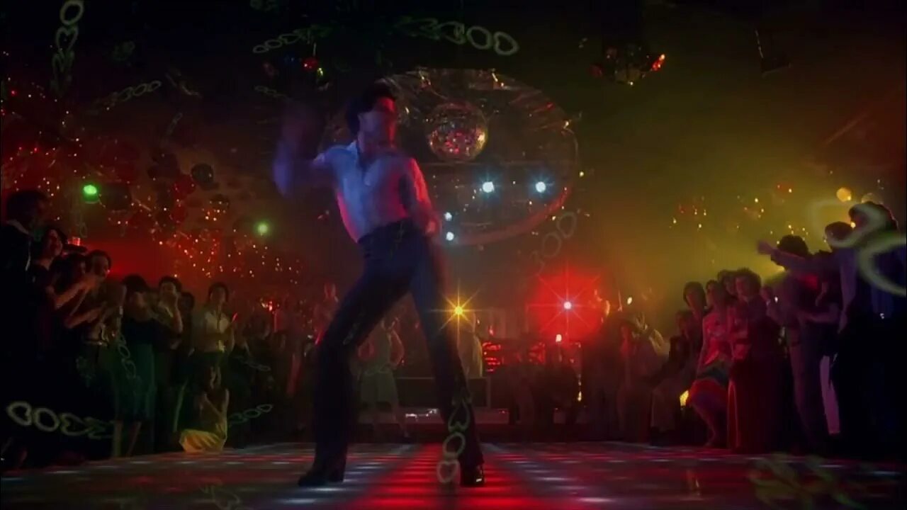 Танец песни день и ночь. Джон Траволта диско танец. Траволта Saturday Night Fever танец. Джон Траволта лихорадка субботнего вечера танец. Траволта Saturday Night Fever gif.