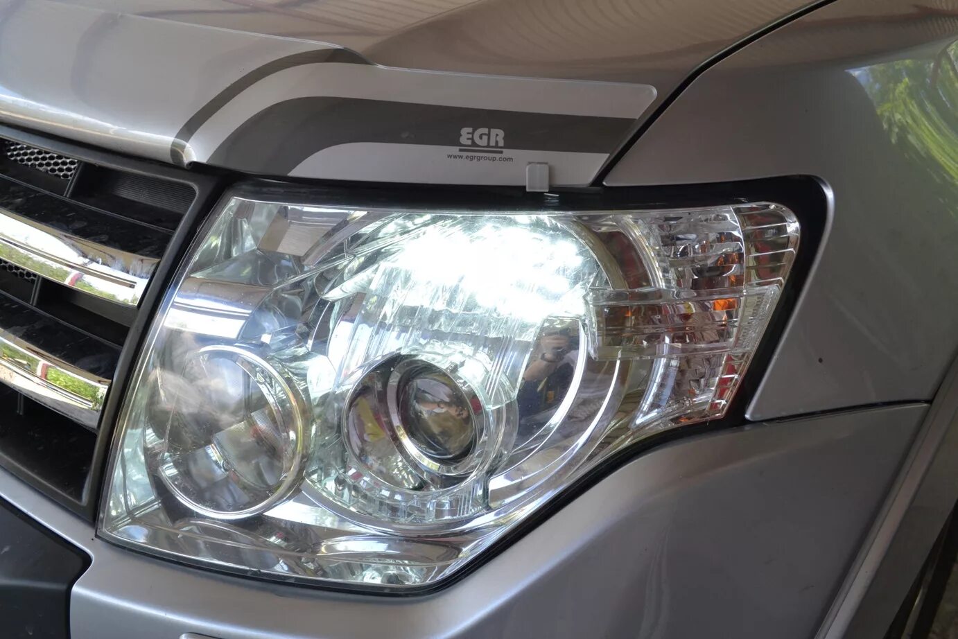 Фара Митсубиси Паджеро 4. Мицубиси Паджеро 4 фары передние. Mitsubishi Pajero 4 Headlight. Mitsubishi Pajero 4 Headlight led. Фары pajero sport