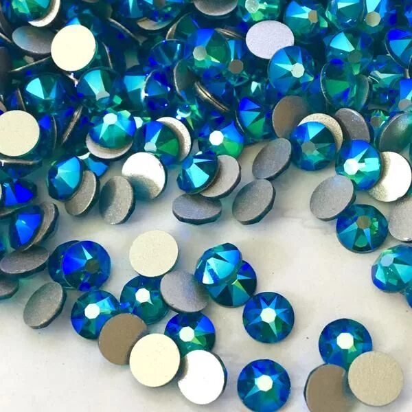Blue zircon. Zircon crystal. сваровски блю циркон. блю циркон цвет страз. shimmering sapphire.