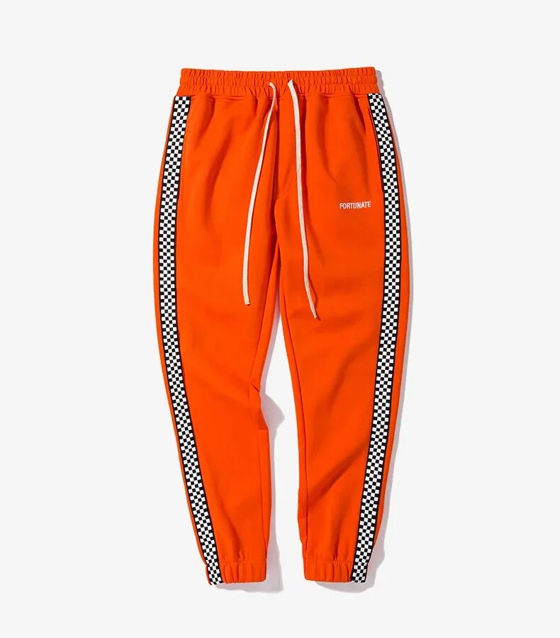 Оранжевые спортивные штаны. Оранжевые спортивные брюки. Оранжевые штаны мужские. Брюки оранжевые мужские спортивные. Оранжевые штаны купить