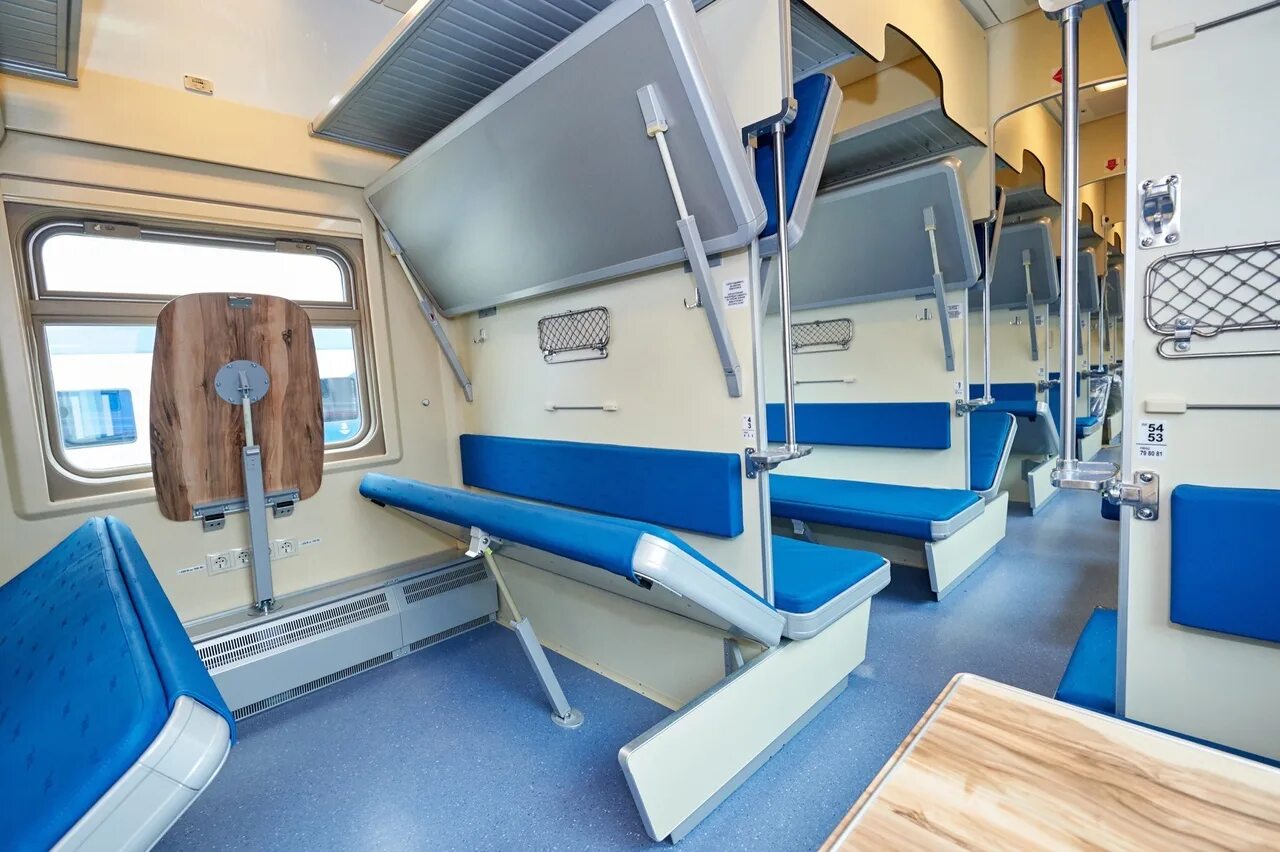 102м «премиум» фпк. Вагоны плацкарт ржд 2020. Как выглядит новый поезд. Новые вагоны ржд плацкарт. Новый плацкартный вагон ржд.