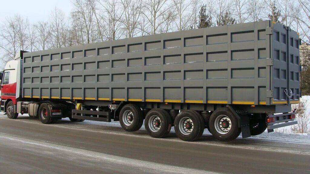 тонар полуприцеп самосвальный. грюнвальд полуприцепы бортовые. тонар большой полуприцеп. большие полуприцепы. тонар 9598.