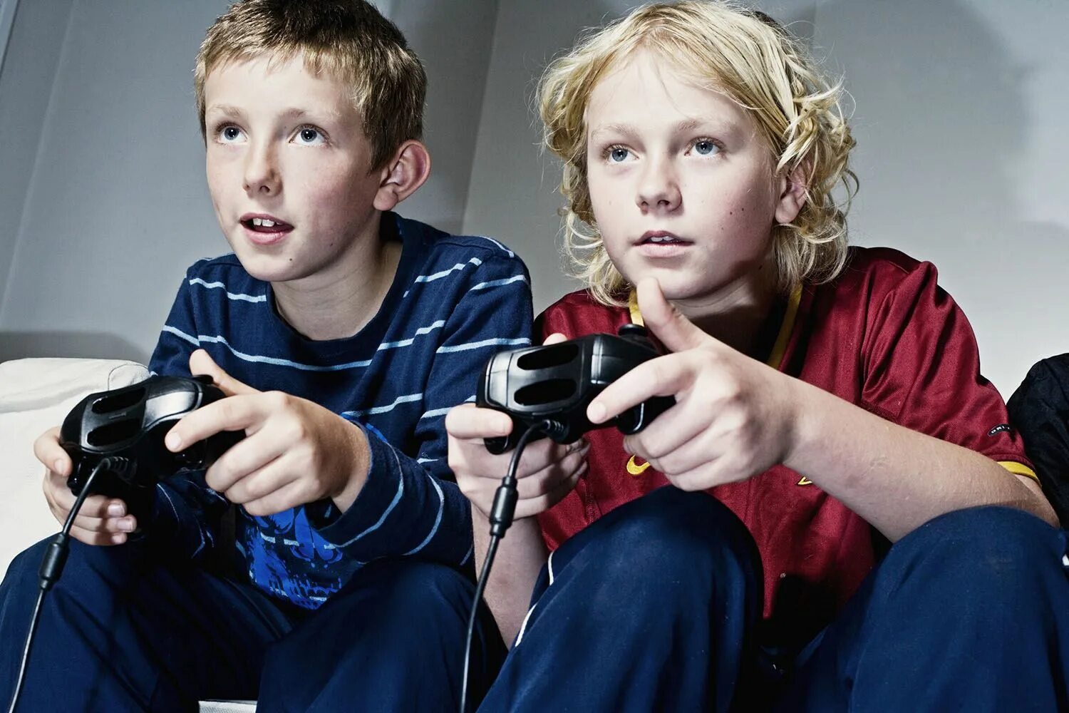 Children playing are computer games the now. Children playing are computer games the now