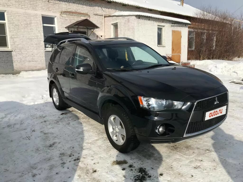 Mitsubishi Outlander 2 Рестайлинг 2010. Аутлендер 2010 года черный. Аутлендер II Рестайлинг 2.0 CVT (147 Л.С.) Б/У черный. Mitsubishi Outlander 2 на штампах.