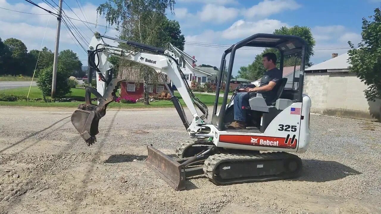 Мини экскаватор б у в россии. Bobcat x325. Bobcat 325. Мини экскаватор Бобкэт. Миниэксковатор Bobcat 322**g.