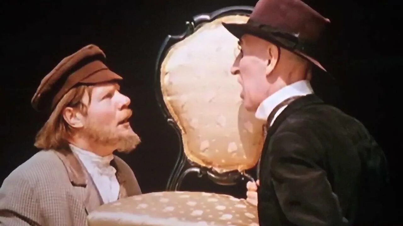 Отец фёдор 12 стульев. Отца федора 12 стульев. Батюшка 12 стульев. Отец фёдор с колбасой на скале. Отца федора 12 стульев.