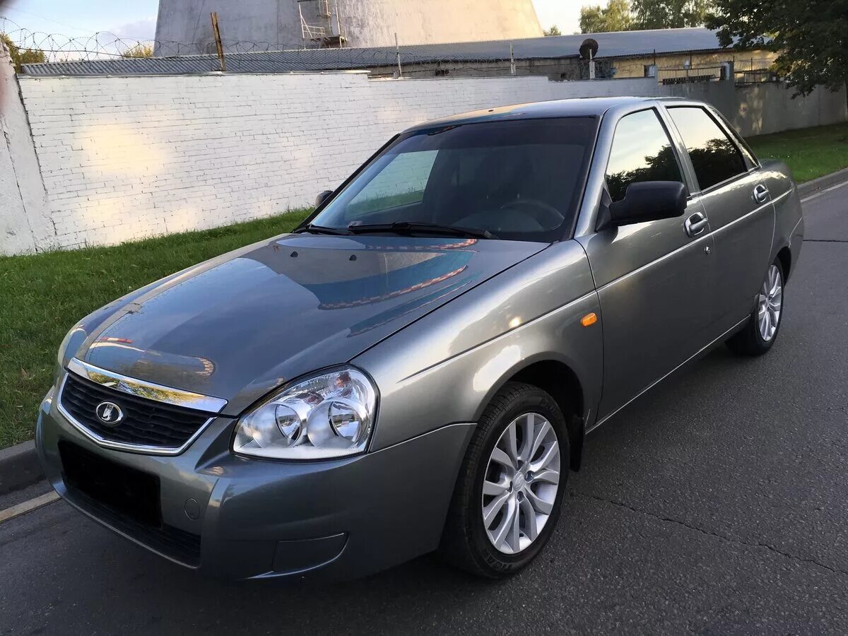 Лада приора 2011 года. Ваз 217030 приора. Приора 2011 седан зеленая. Приора 1 2011 год. Лада priora 2011.