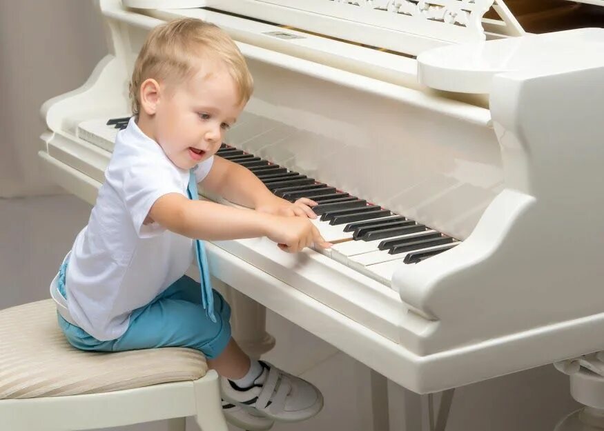 Piano play the don t. Little boy playing Piano at Home. Concept of Music. Playing the Piano at Home. Boy playing the Piano picture for Kids. Little boy Piano Performance.