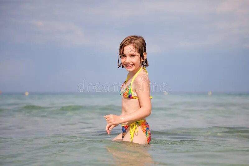 Little girl bathes in lake stock image. Image of warmth - 76687363
