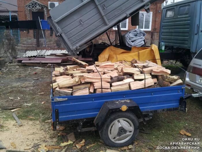 Сколько в прицепе кубов дров. Прицеп для дров. дрова в прицепе автомобиля. автомобильный прицеп с дровами. легковой прицеп с дровами.