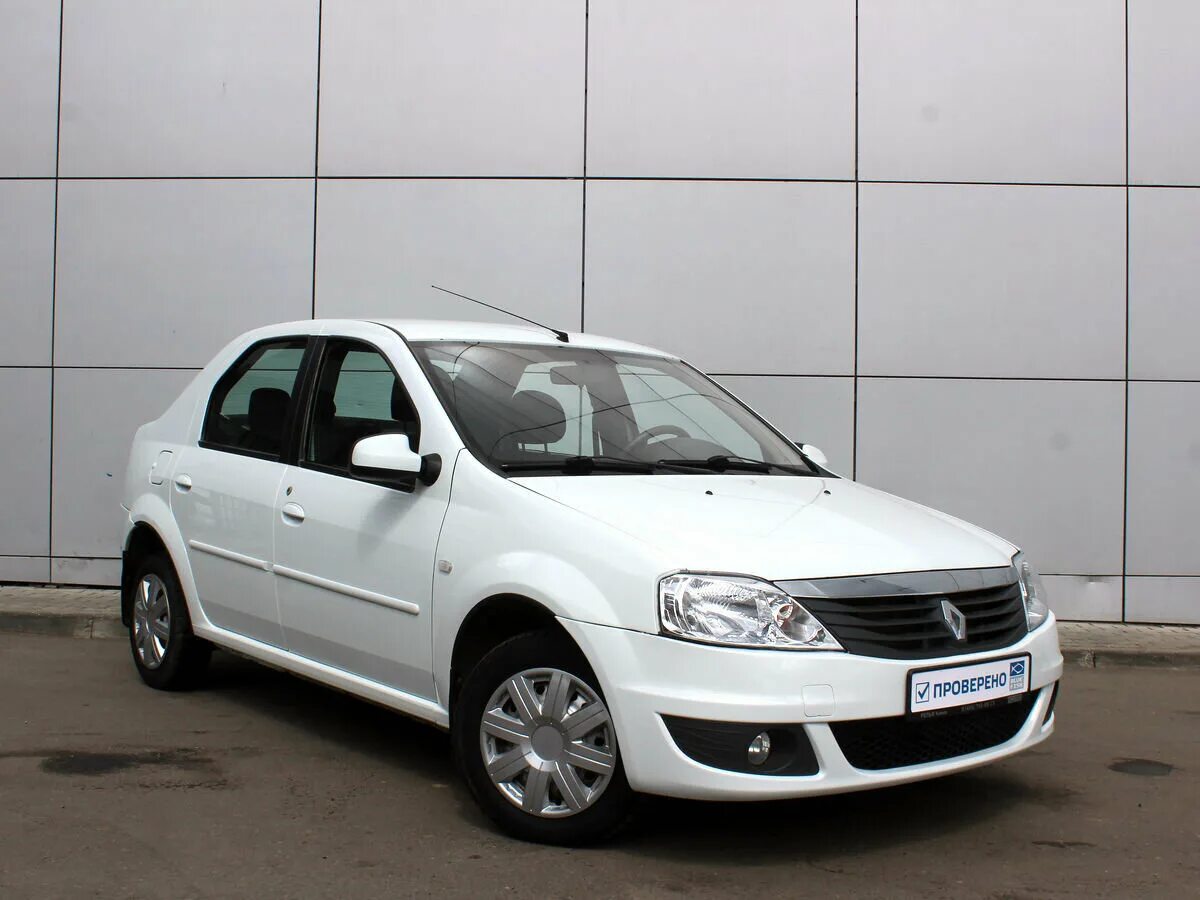 Рено логан 1 выпуска. Renault Logan 2012. Renault Logan 2012 года белый. Рено Логан 2012 белый. Рено Логан 2012.