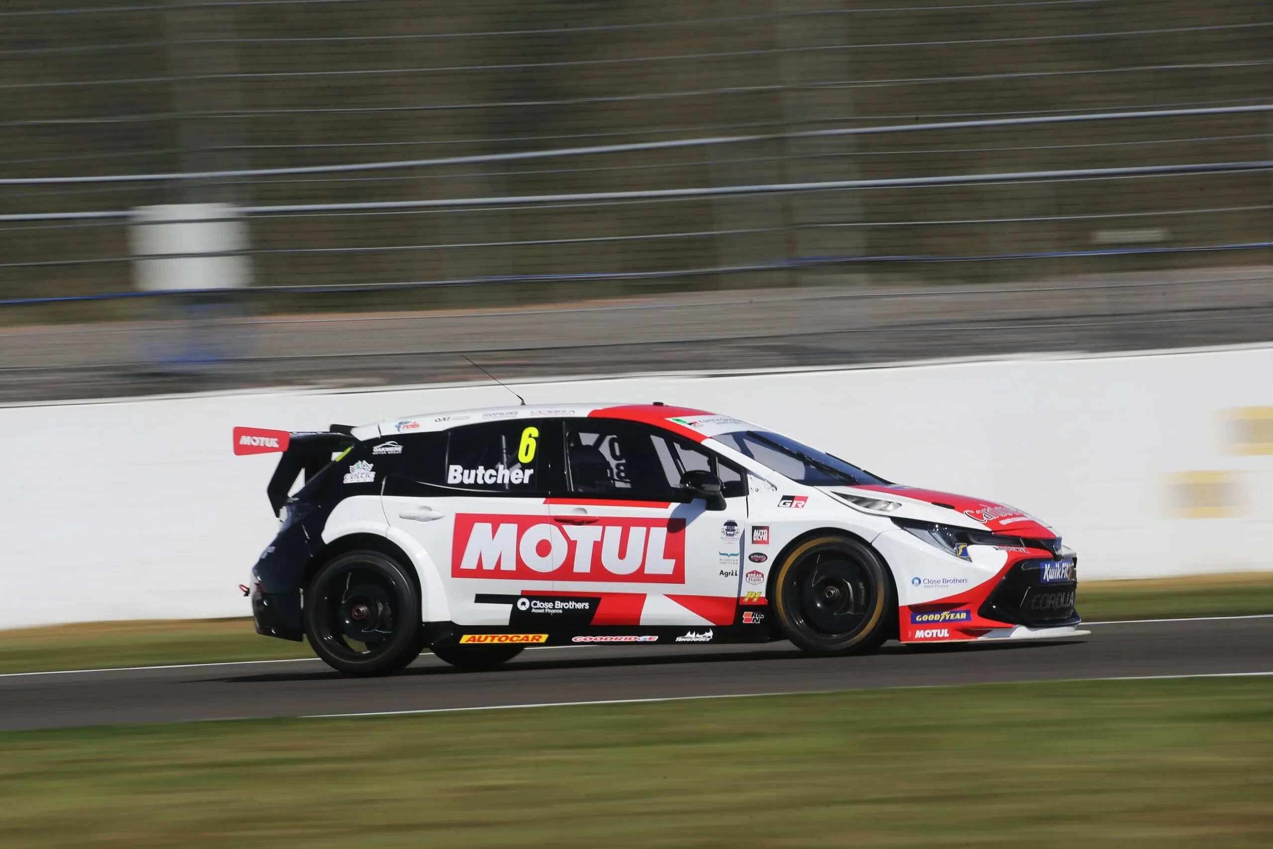 Racing uk. Toyota gazoo 2021. Toyota gazoo Racing (TGR). BTCC 2021. Toyota gazoo Racing комбинезон.