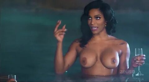 Joseline shows boobs.