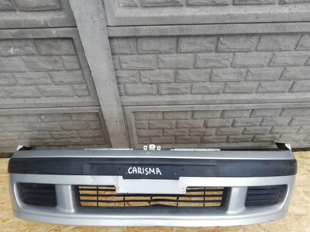 Mitsubishi carisma 2002 передний бампер. Бампер передний митсубиси каризма 2003 артикул. Передний бампер митсубиси каризма 2003. Бампер митсубиси каризма 2002. Передний бампер мицубиси каризма.