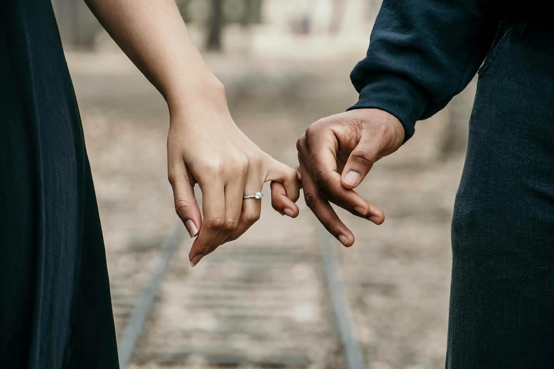Hand in hand with one another