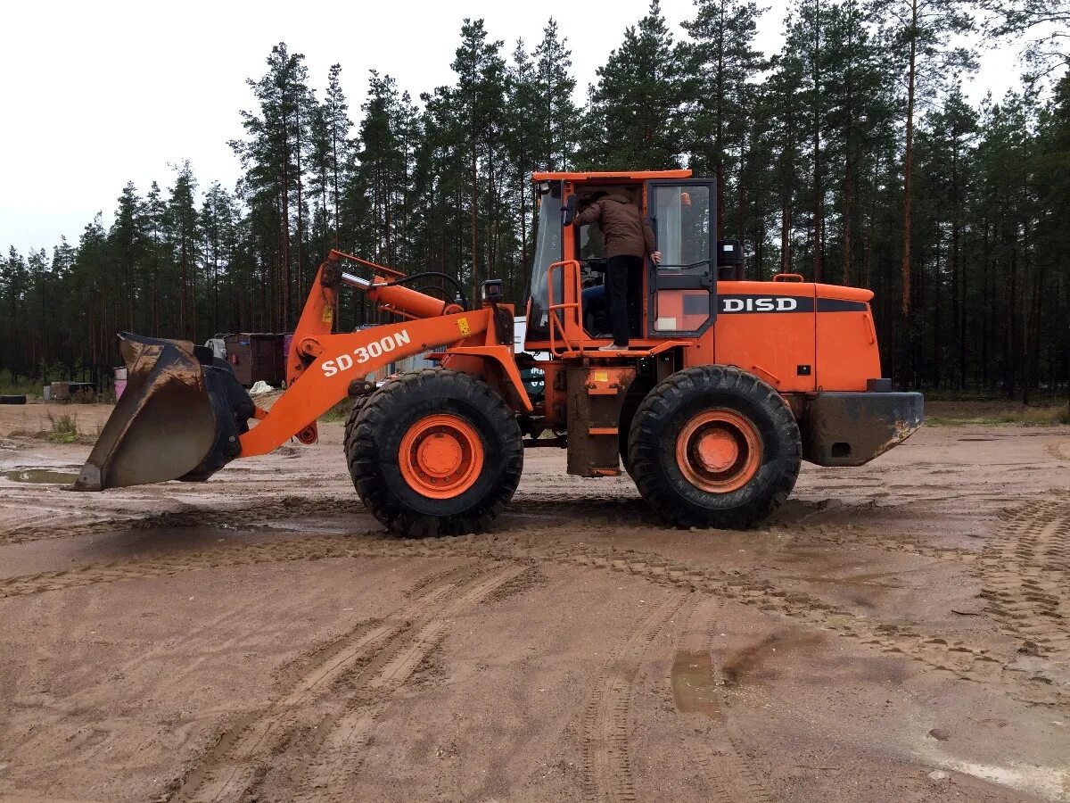 Сд 300. Фронтальный погрузчик Doosan sd300. SD 300 фронтальный погрузчик. Погрузчик Дусан 300. Фронтальный погрузчик Доосан 450.