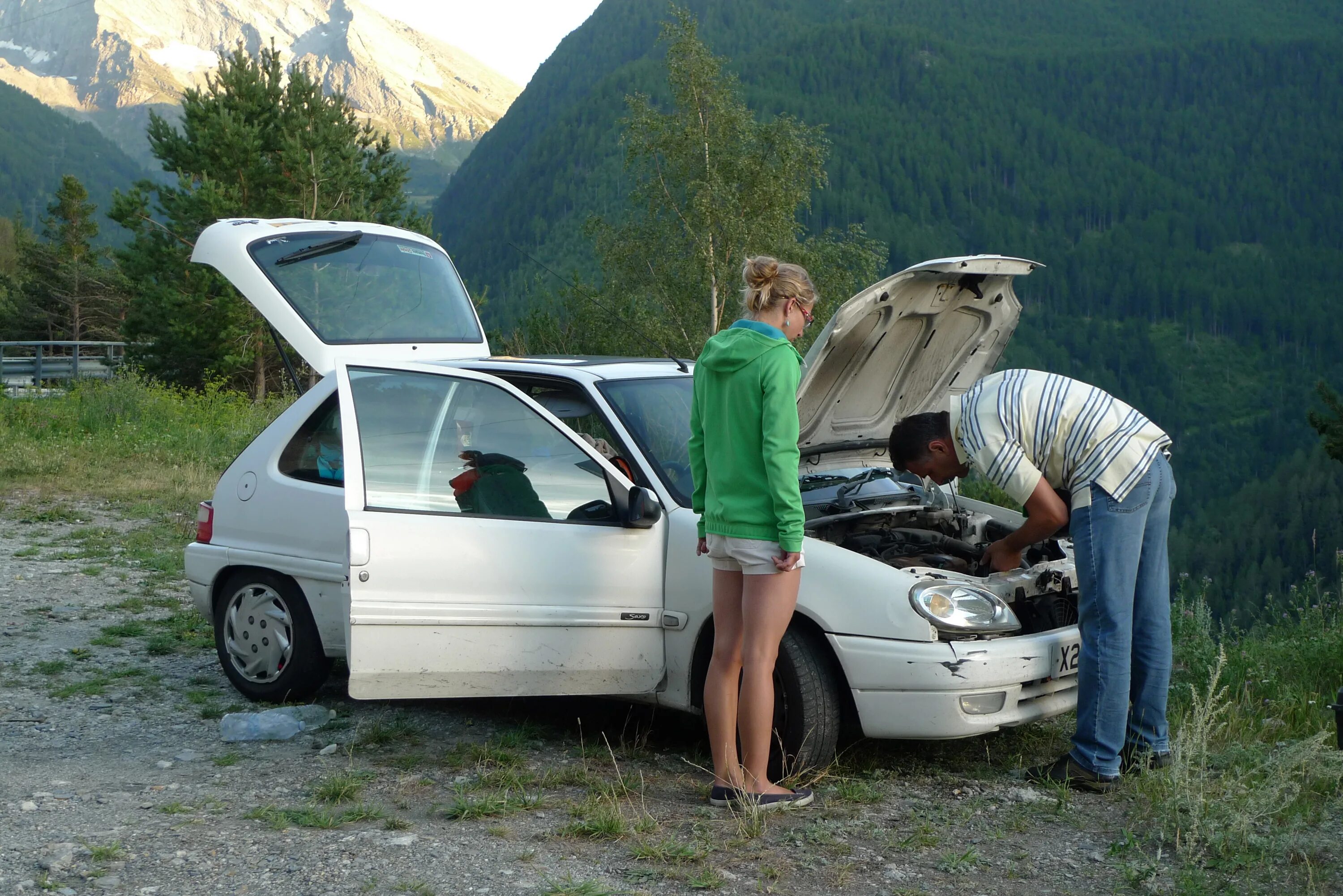 Car broke down. Car Breaks down. Car broke down on the Road. Upside down car.