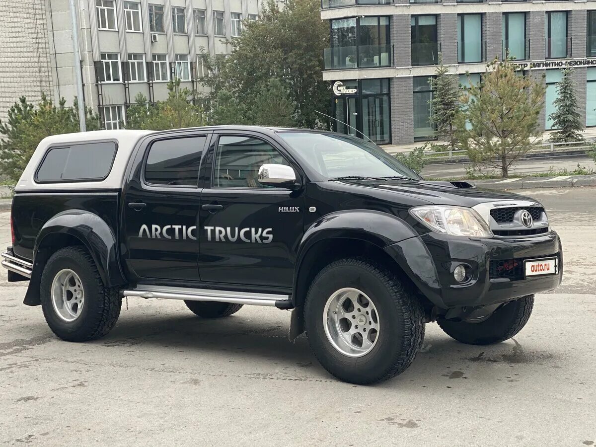 Тойота хайлюкс бу купить в россии. Toyota Hilux Arctic Trucks. Тойота Хайлюкс 2010. Hilux 2012 Arctic Trucks. Тойота Хайлюкс Арктик 2010 года.