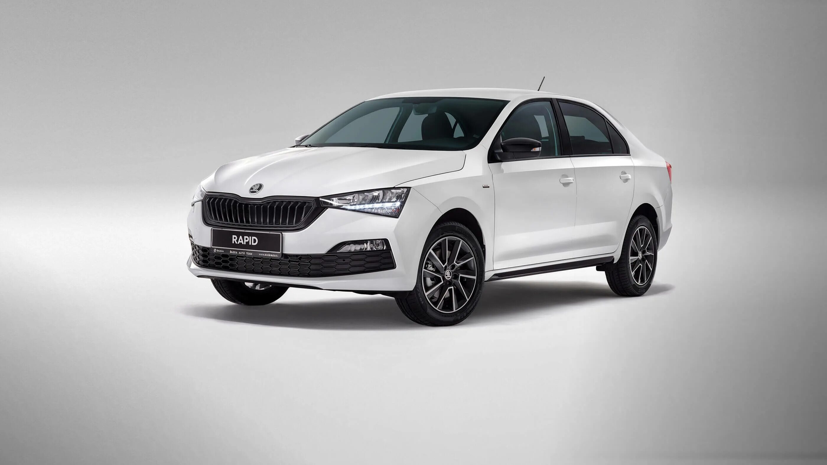 Купить рапид шкода у официального. Skoda Rapid 2022. Skoda Рапид 2022. Новая Шкода Рапид 2022. Шкода Рапид 2022 белая.