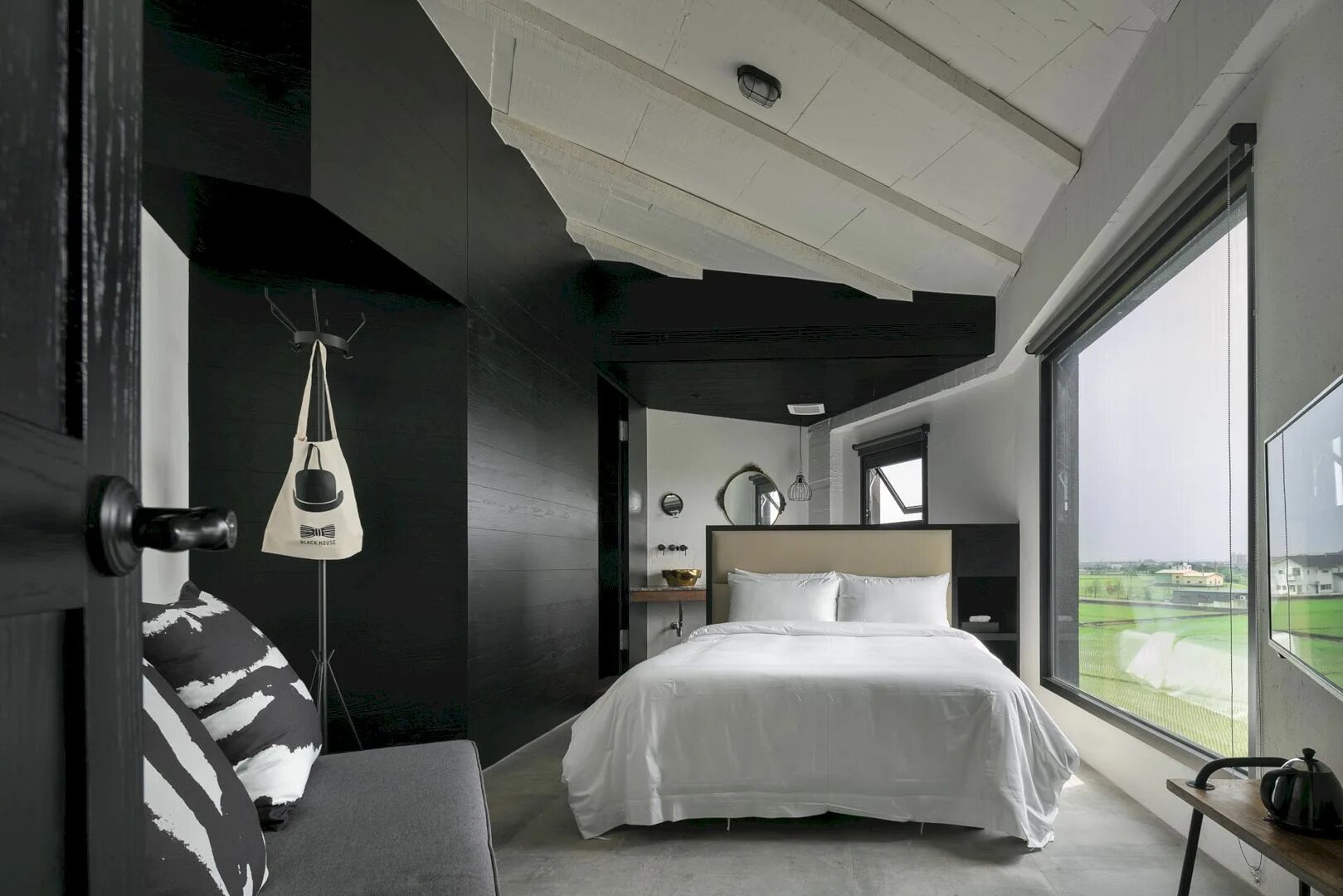 Black House looking from inside. Creative Black Hotel photo. Wonder rooms