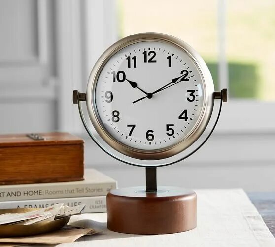 The clock is the desk