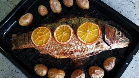 Карп в духовке целиком с лимоном