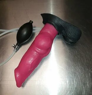 Squirting dog dildo with inflatable knot.